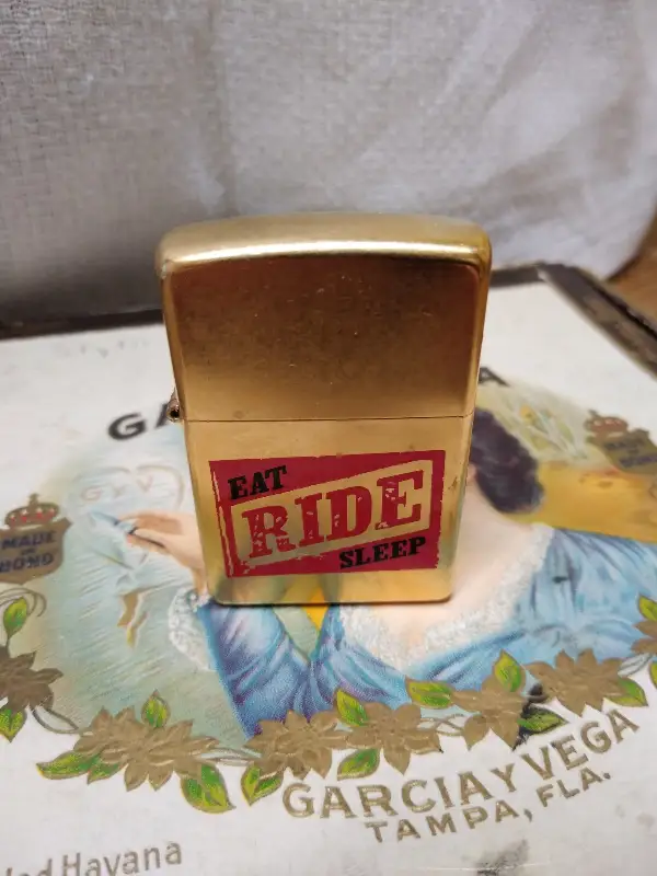 Vtg Unfired Zippo Gold Tone Marlboro Cigarette Lighter EAT RIDE SLEEP 2004